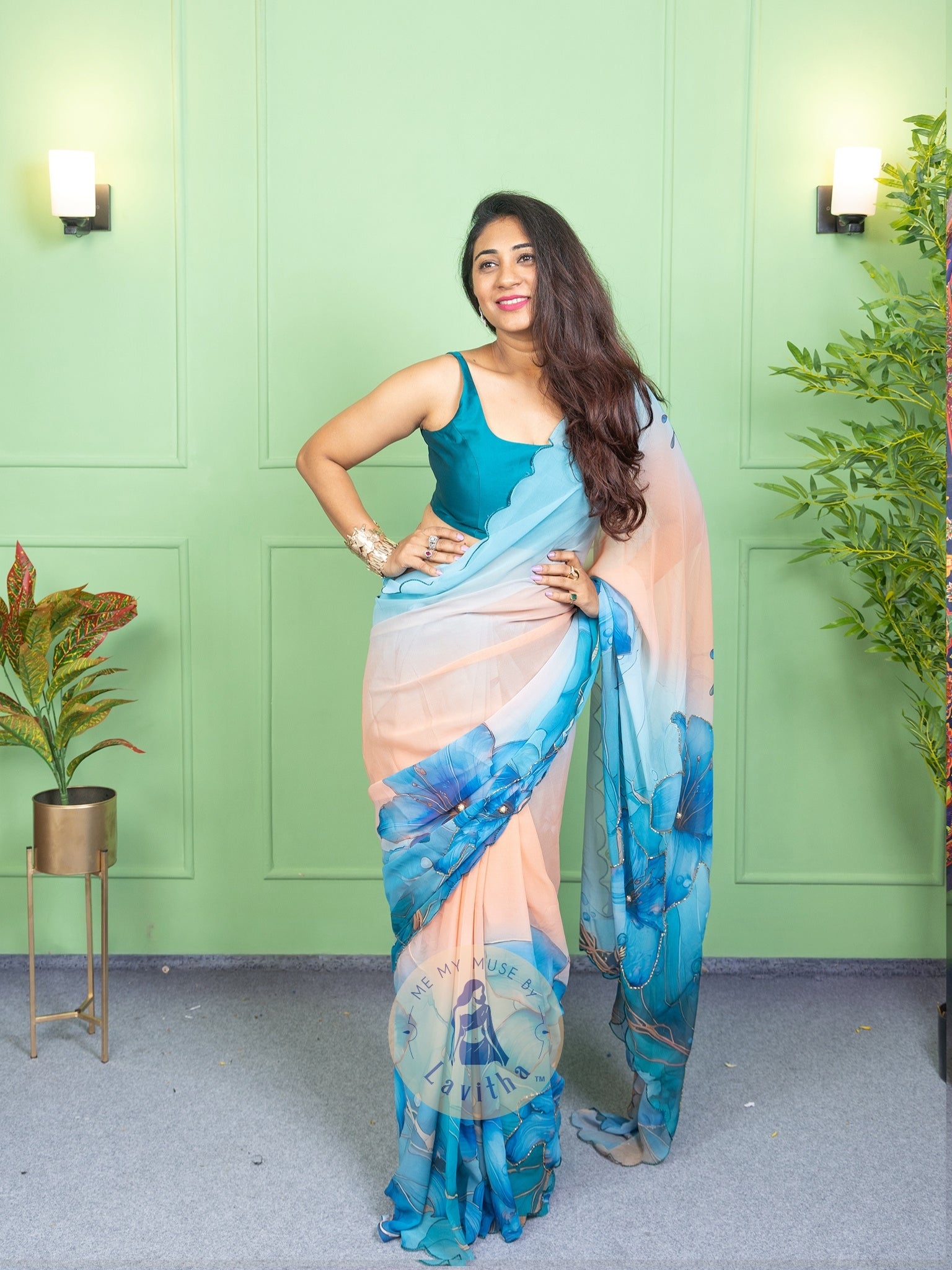 Our muse in a bollywood-style glamorous green chiffon saree with floral katdana work with ready-to-wear Rama Green brocade blouse perfect for parties and dinner dates exclusively from Me My Muse by Lavitha