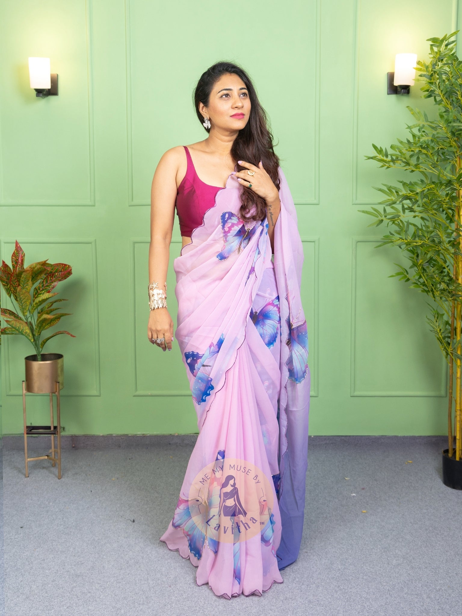 Our muse in a bollywood-style glamorous purple chiffon saree with butterfly katdana work with ready-to-wear Purple brocade blouse perfect for parties and dinner dates exclusively from Me My Muse by Lavitha