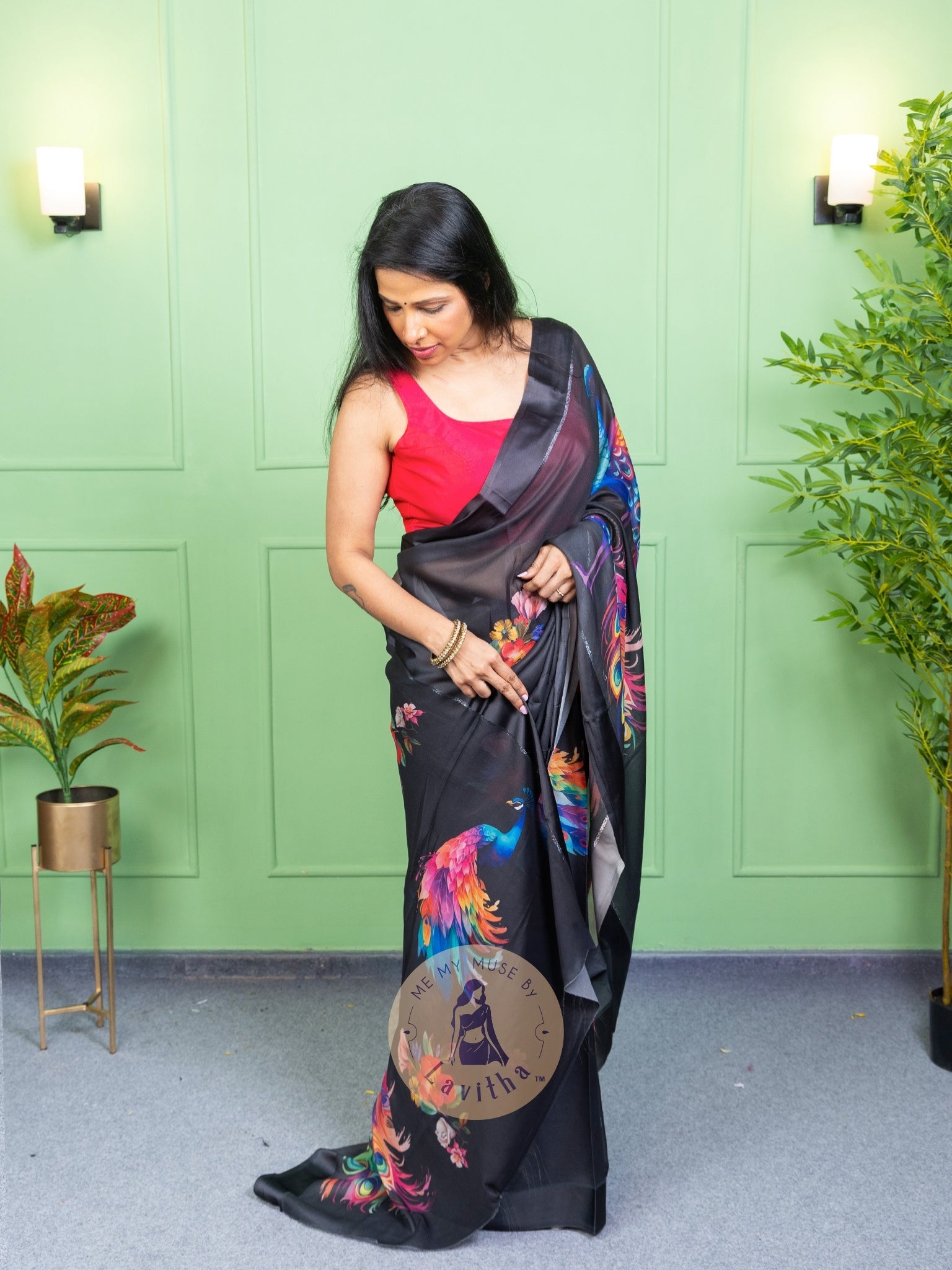 Our muse in a black peacock print chiffon saree with ready-to-wear silk padded blouse saree from Me My Muse by Lavitha