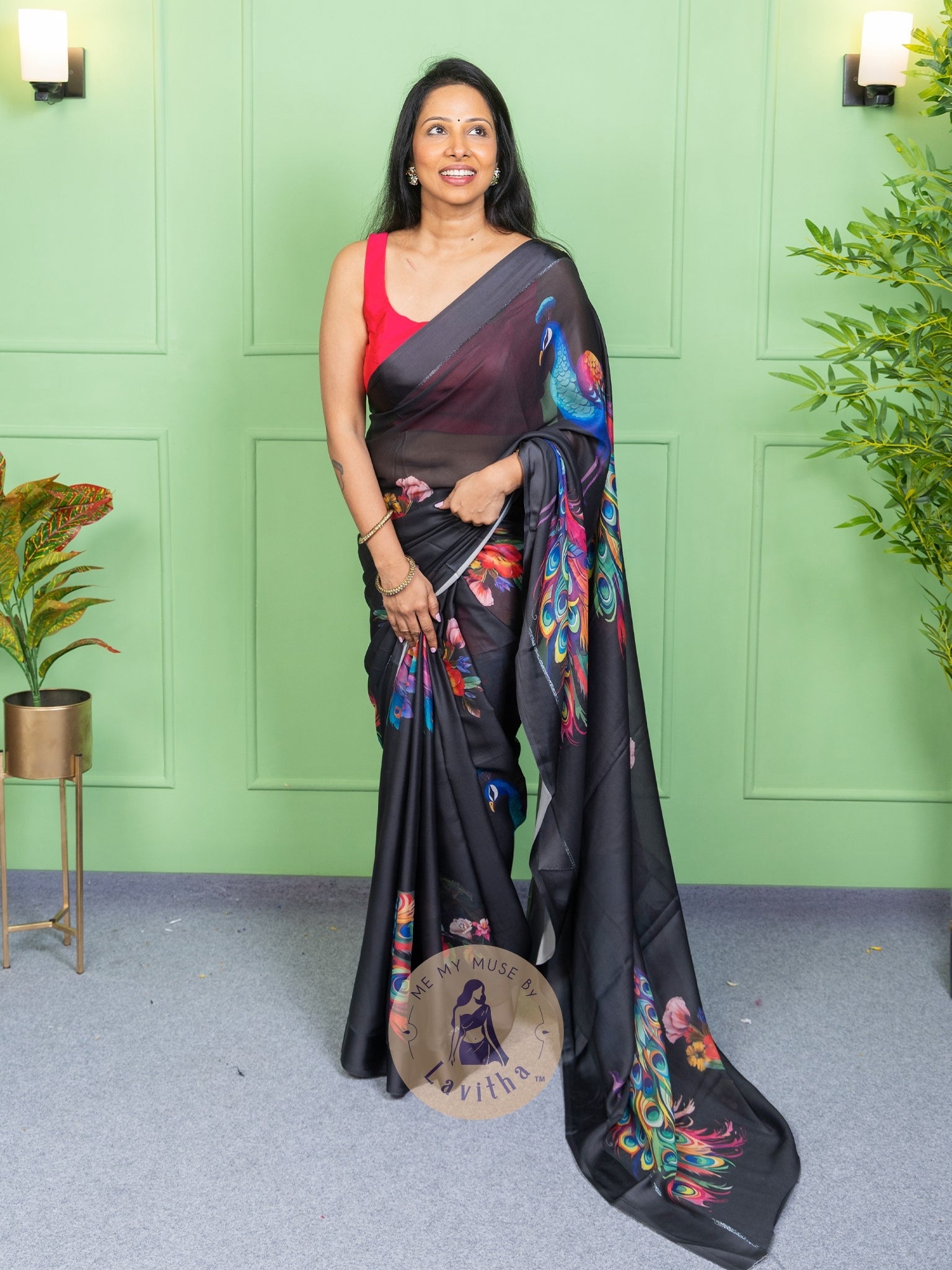 Our muse in a black peacock print chiffon saree with ready-to-wear silk padded blouse saree from Me My Muse by Lavitha