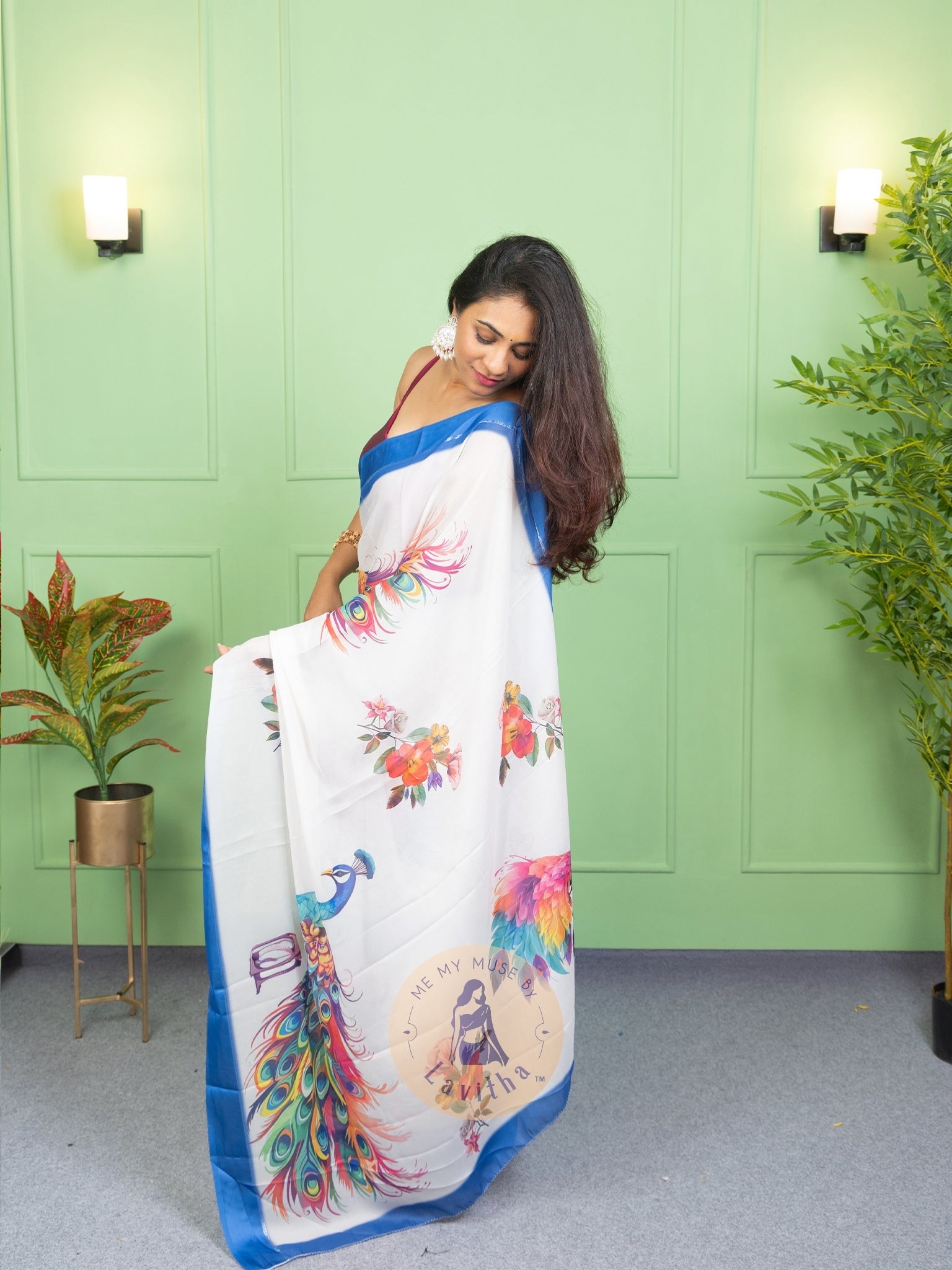 Our muse in a White peacock print chiffon saree with ready-to-wear silk padded blouse saree from Me My Muse by Lavitha