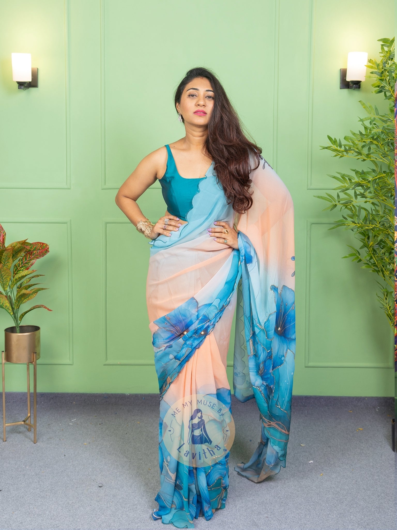 Our muse in a bollywood-style glamorous green chiffon saree with floral katdana work with ready-to-wear Rama Green brocade blouse perfect for parties and dinner dates exclusively from Me My Muse by Lavitha
