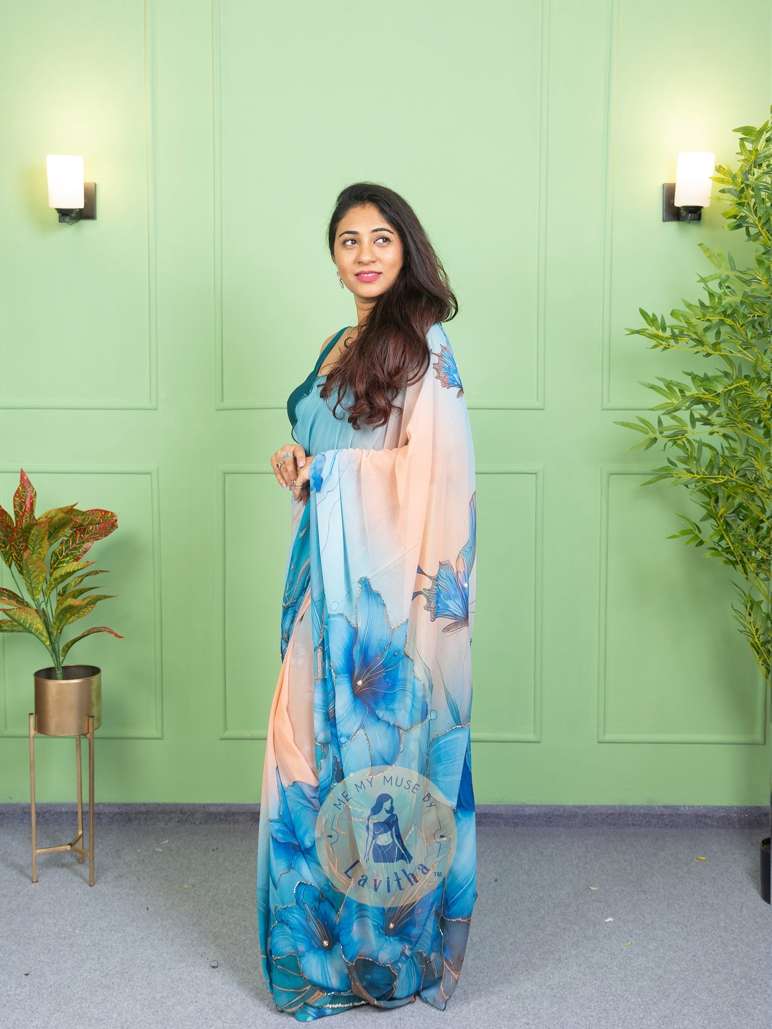 Our muse in a bollywood-style glamorous green chiffon saree with floral katdana work with ready-to-wear Rama Green brocade blouse perfect for parties and dinner dates exclusively from Me My Muse by Lavitha