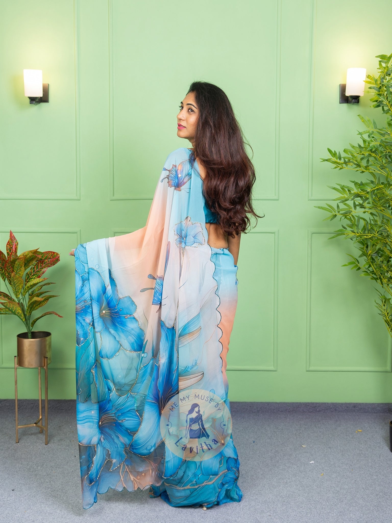 Our muse in a bollywood-style glamorous green chiffon saree with floral katdana work with ready-to-wear Rama Green brocade blouse perfect for parties and dinner dates exclusively from Me My Muse by Lavitha