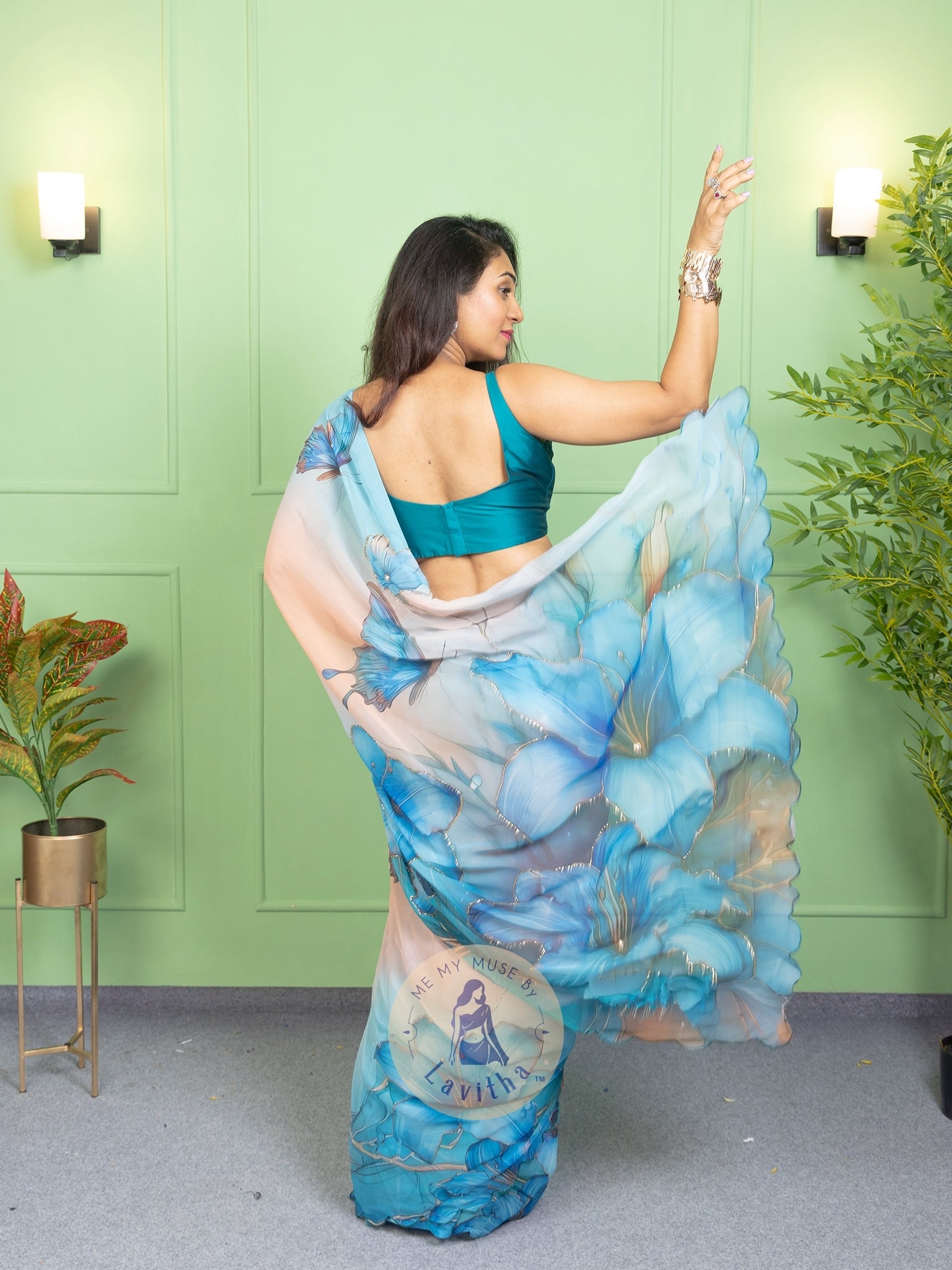 Our muse in a bollywood-style glamorous green chiffon saree with floral katdana work with ready-to-wear Rama Green brocade blouse perfect for parties and dinner dates exclusively from Me My Muse by Lavitha