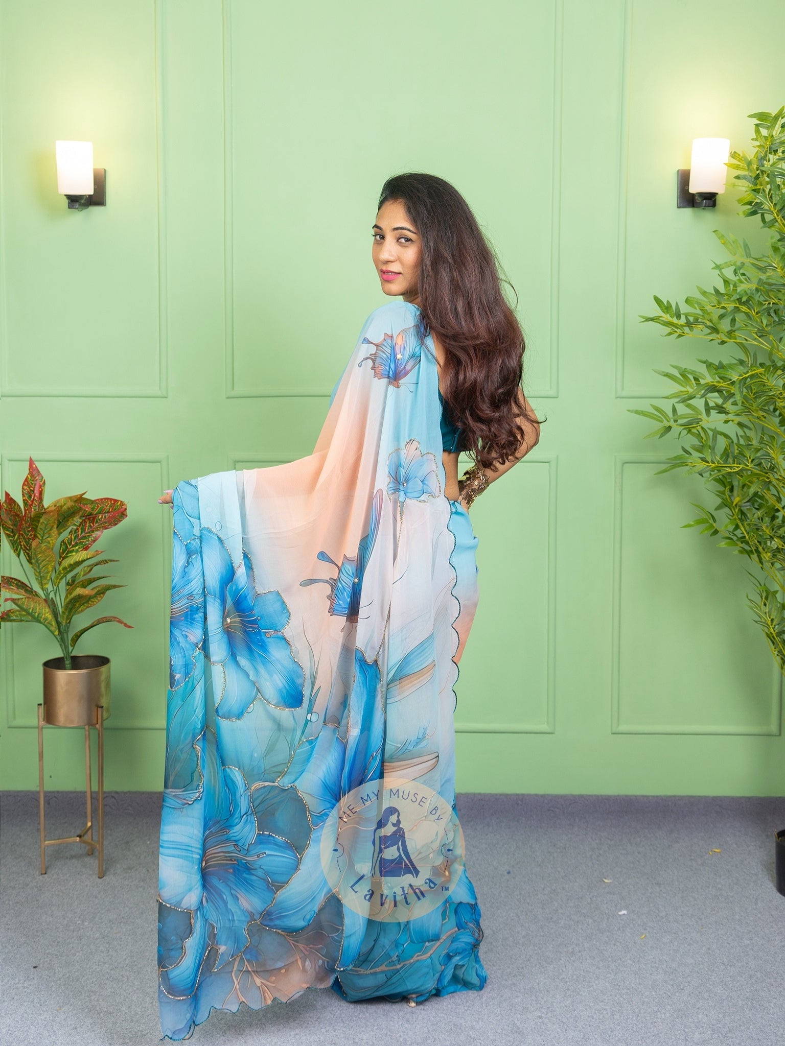 Our muse in a bollywood-style glamorous green chiffon saree with floral katdana work with ready-to-wear Rama Green brocade blouse perfect for parties and dinner dates exclusively from Me My Muse by Lavitha