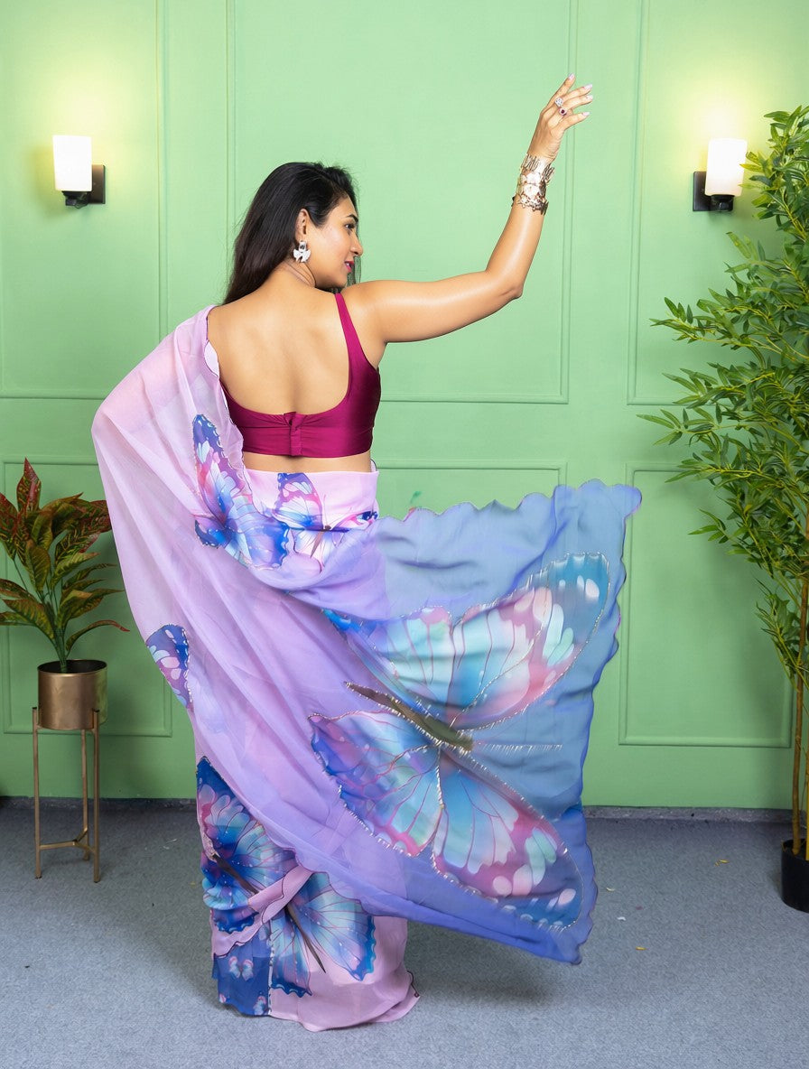 Our muse in a bollywood-style glamorous purple chiffon saree with butterfly katdana work with ready-to-wear Purple brocade blouse perfect for parties and dinner dates exclusively from Me My Muse by Lavitha