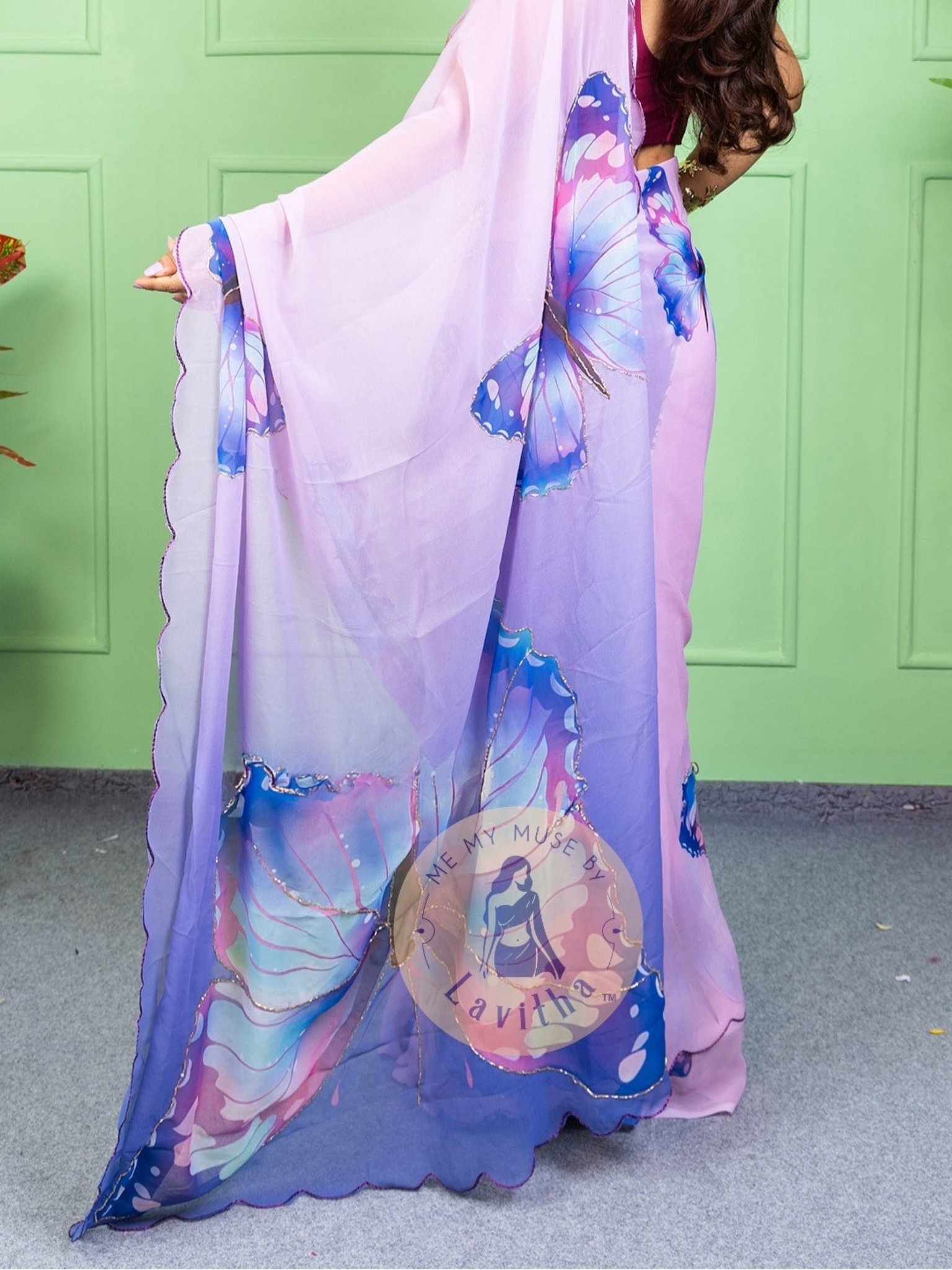 Our muse in a bollywood-style glamorous purple chiffon saree with butterfly katdana work with ready-to-wear Purple brocade blouse perfect for parties and dinner dates exclusively from Me My Muse by Lavitha