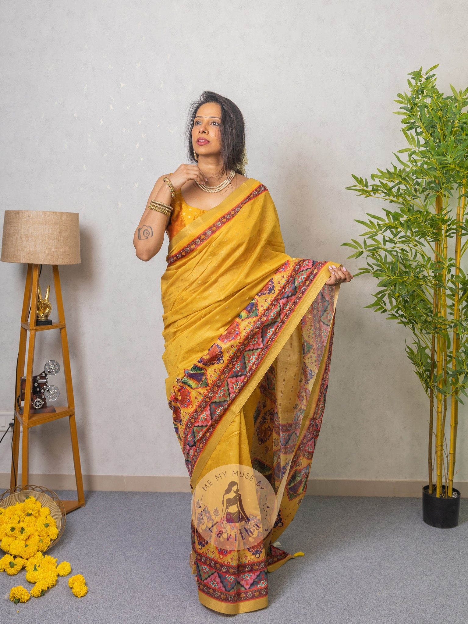 Our muse in a Mustard Yellow Chanderi Cotton saree with ready-to-wear Mustard Yellow Silk Butti Padded Blouse exclusively available on Me My Muse by Lavitha