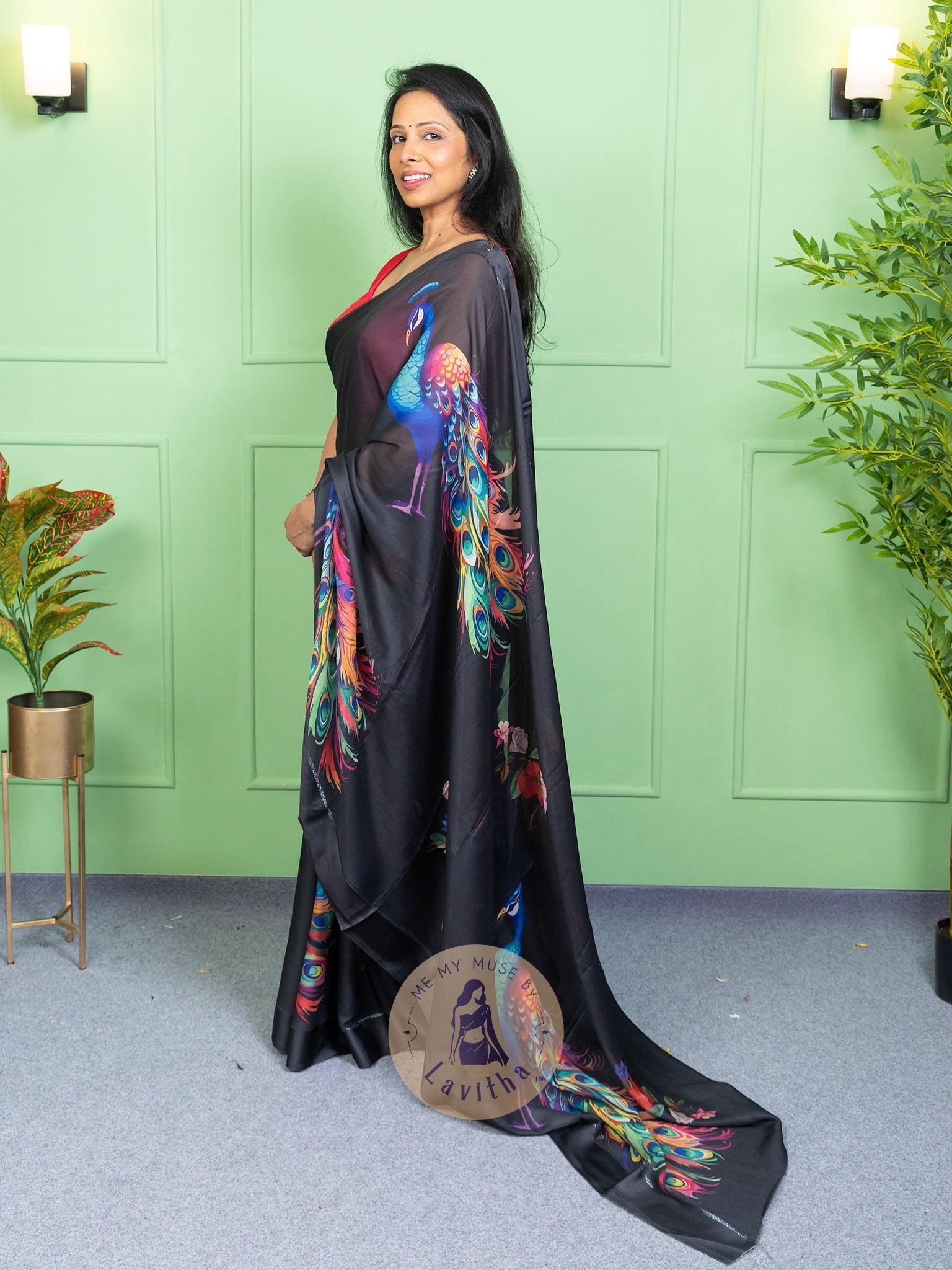 Our muse in a black peacock print chiffon saree with ready-to-wear silk padded blouse saree from Me My Muse by Lavitha
