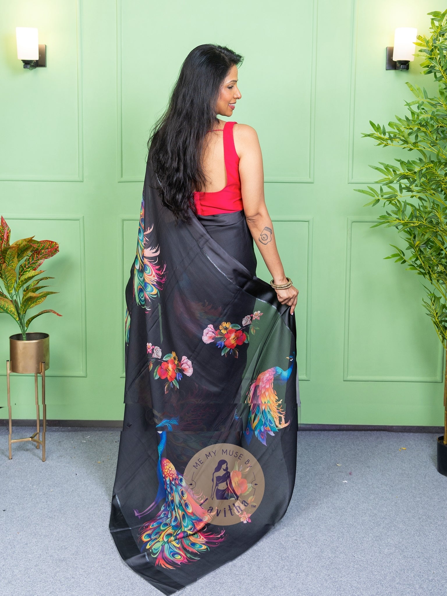 Our muse in a black peacock print chiffon saree with ready-to-wear silk padded blouse saree from Me My Muse by Lavitha