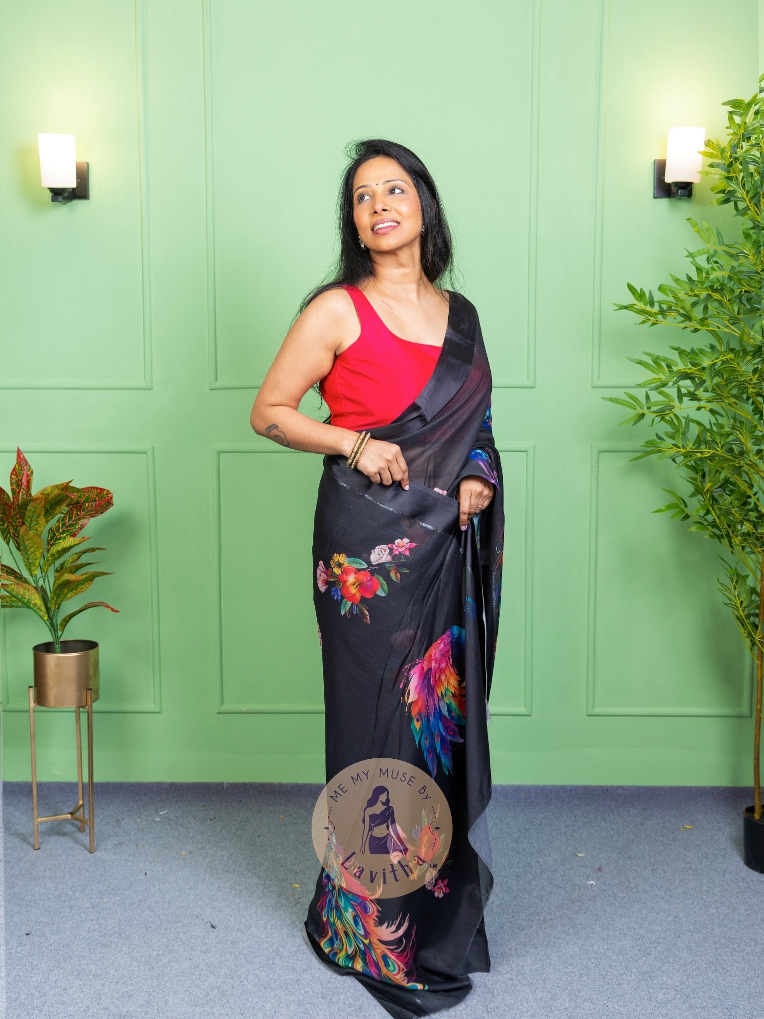 Our muse in a black peacock print chiffon saree with ready-to-wear silk padded blouse saree from Me My Muse by Lavitha