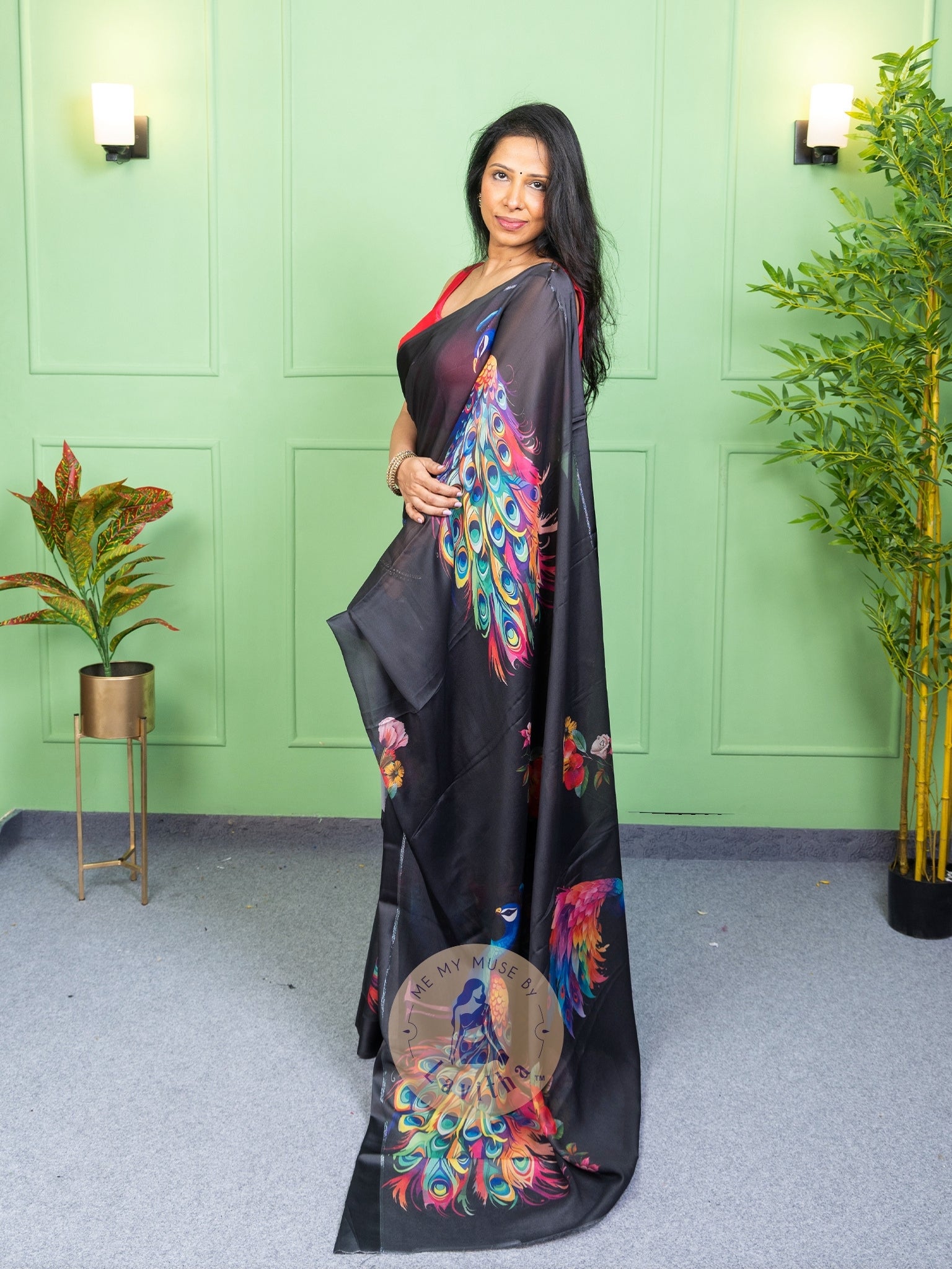 Our muse in a black peacock print chiffon saree with ready-to-wear silk padded blouse saree from Me My Muse by Lavitha